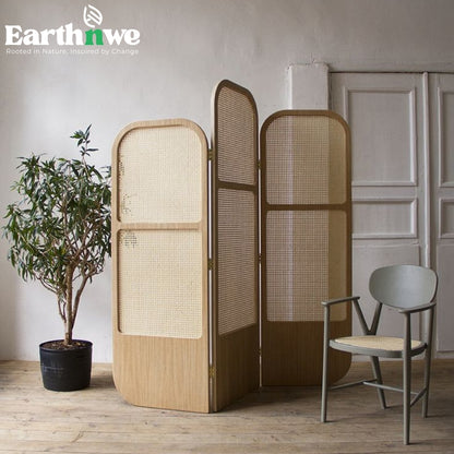 Rattan room partition with folding panels